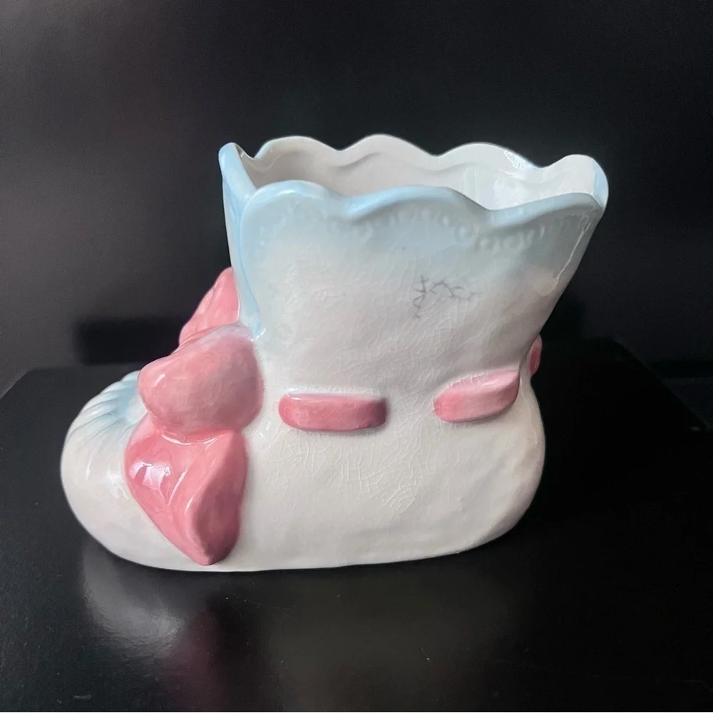 Vintage ceramic baby bootie vase